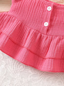 Conjunto de top com suspensórios e laço para bebê.